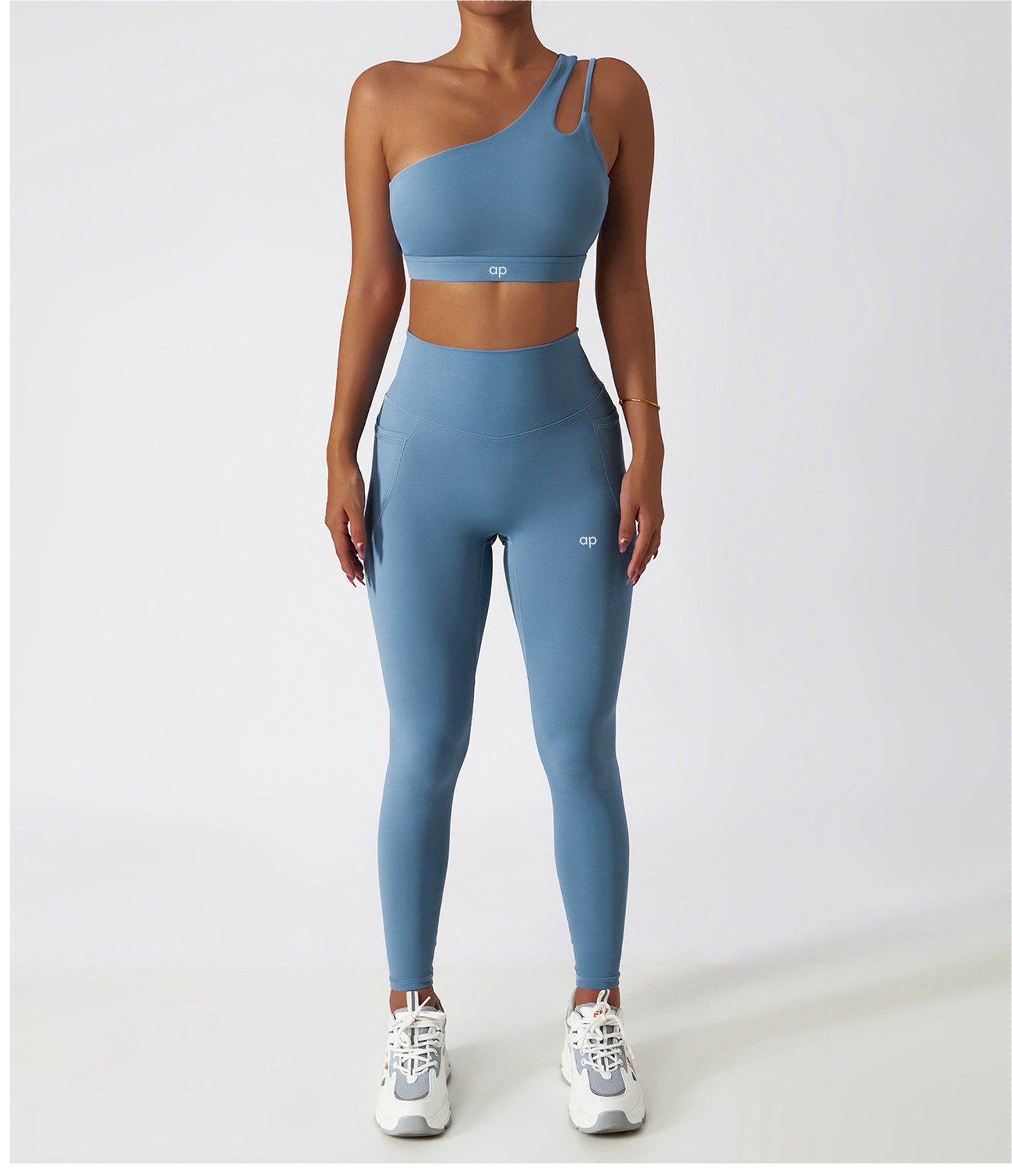 Person wearing a blue athletic outfit with a white background